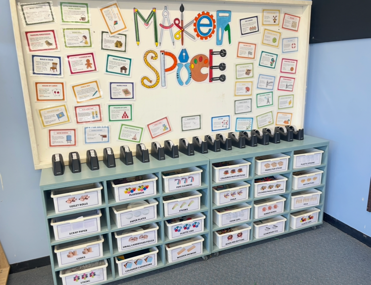 Maker space area with white tubs containing safe building items