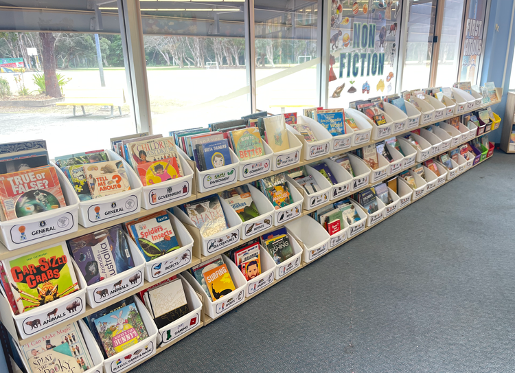 non fiction section with all books in tubs facing forward
