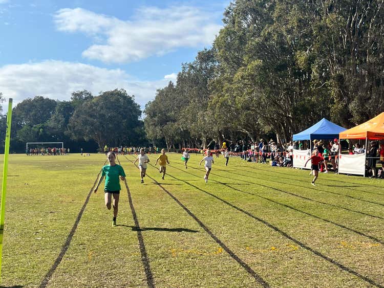 Picture of students running on Yamba Public School oval