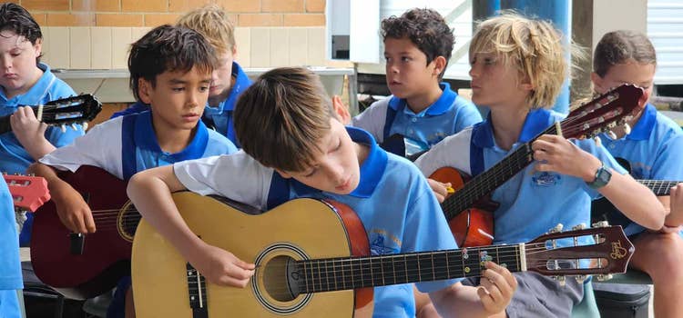 students playing guitar